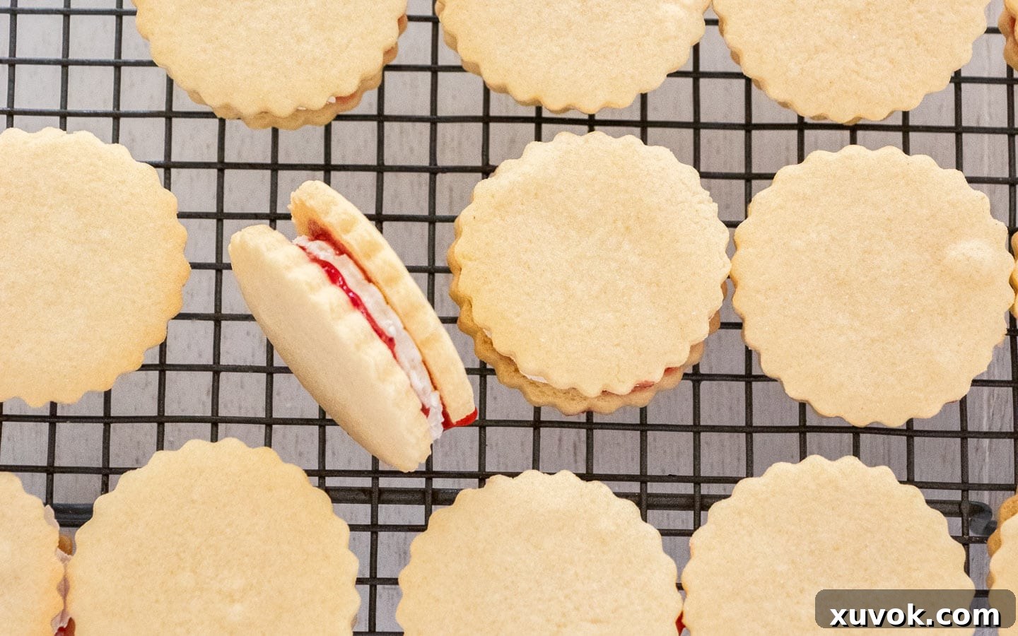The cookies sandwiched together with jam and marshmallow filling.