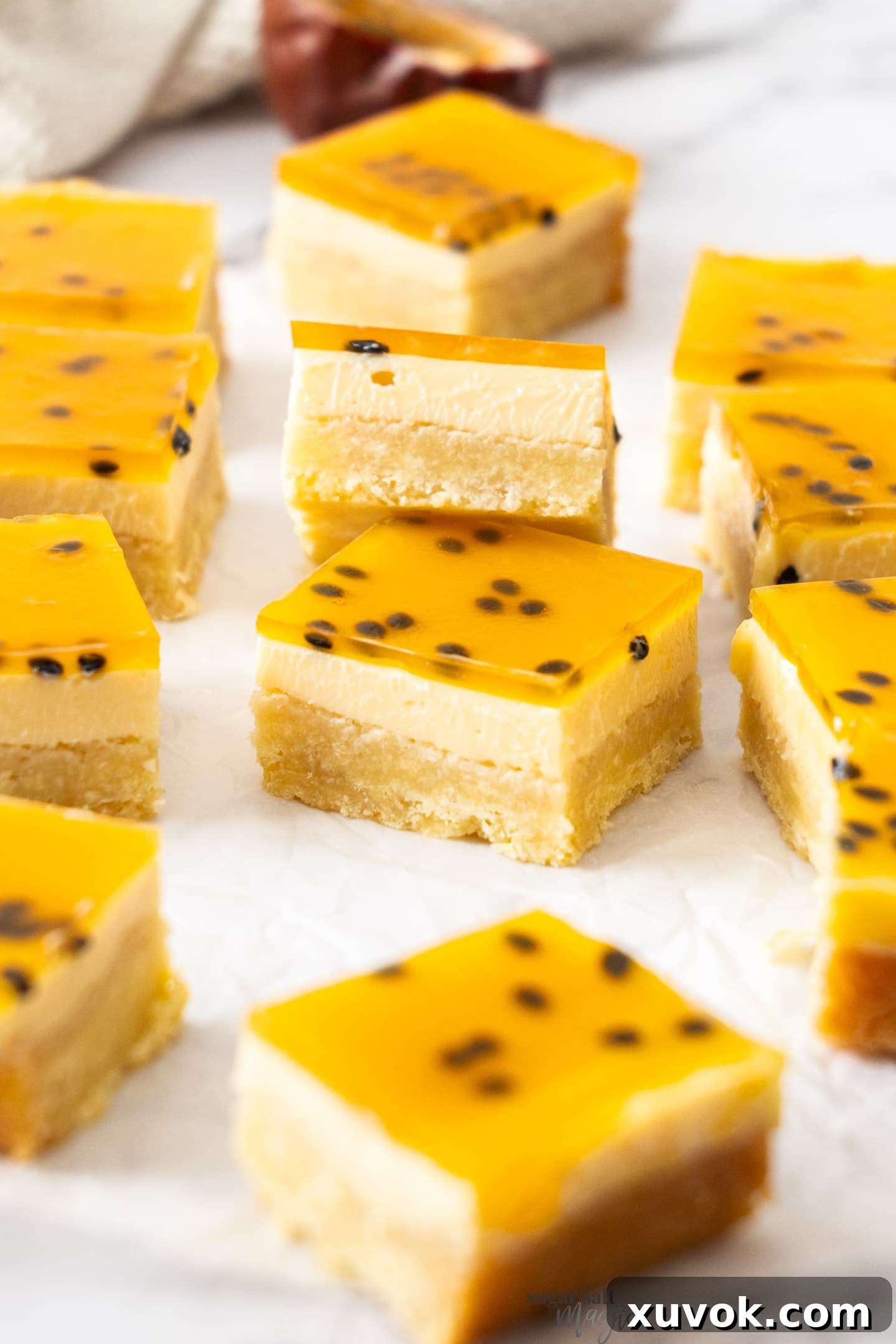 A passionfruit slice leaning up against another.
