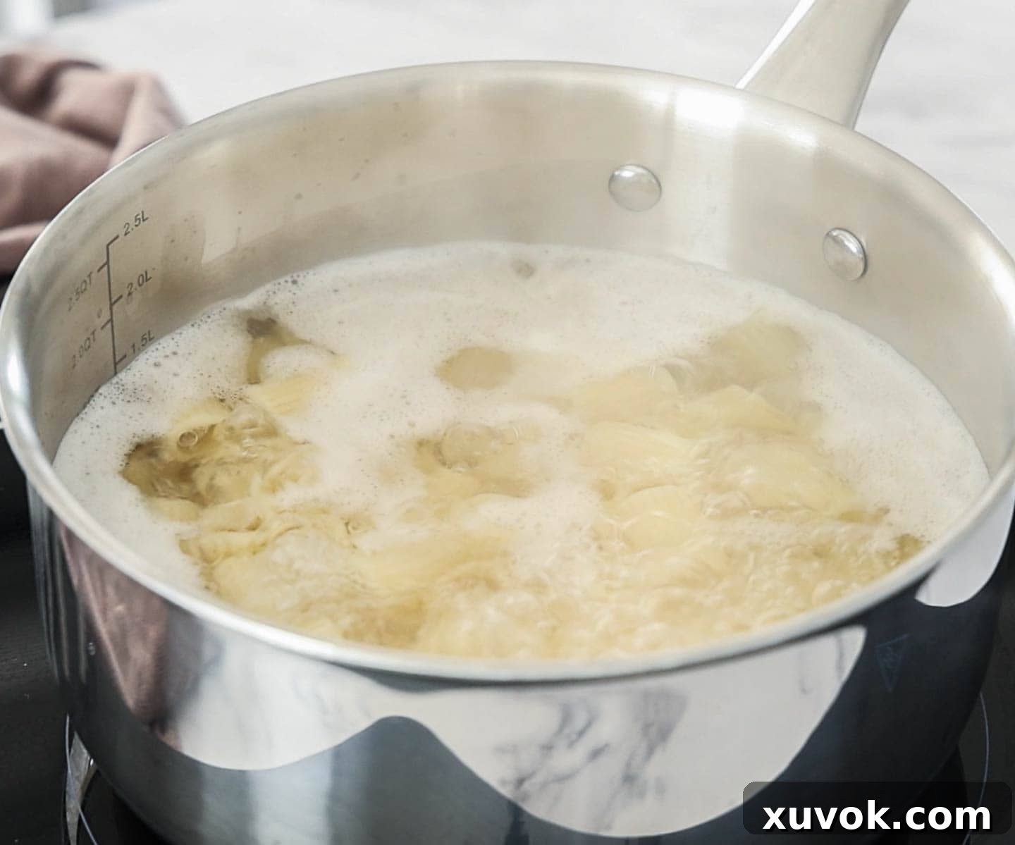 Pasta in a saucepan of boiling water.